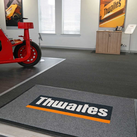 Tapis logo grattant Tapis logo grattant