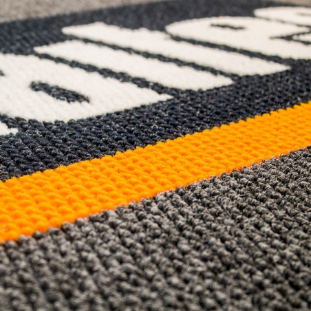 Tapis logo grattant Tapis logo grattant